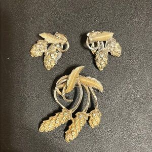 Elegant Gold and Silver Leaf Brooch Set